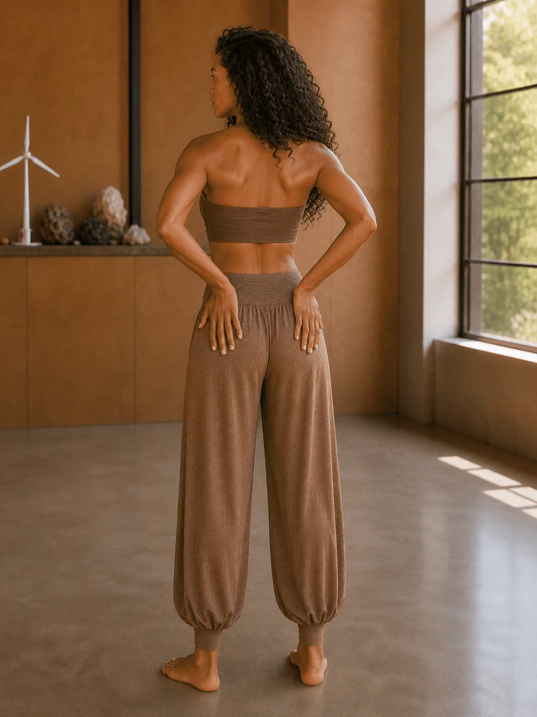 Step 1: Stand with feet about shoulder-width, knees soft. Bring the palms to the lower b